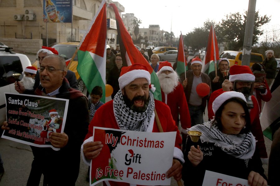 Palestinian Christians in Bethlehem, West Bank, celebrating Christmas amidst conflict and solidarity with the Muslim community
